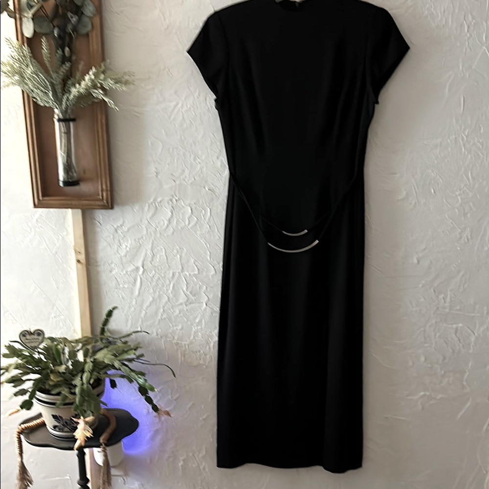 Elegant Black Dress with front slit 
DW3
Size 14